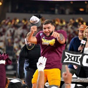 Arizona State Sun Devils running back Cam Skattebo (4) celebrates after the Sun Devils defeat the Iowa State Cyclones at AT&T Stadium.