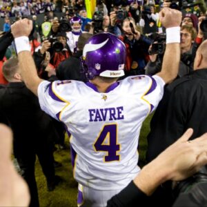 Vikings quarterback Brett Favre (4) celebrates following the game against the Green Bay Packers at Lambeau Field. The Vikings defeated the Packers 38-26.