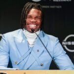 Colorado Buffaloes wide receiver/cornerback Travis Hunter speaks to the press after winning the 2024 Heisman Trophy.