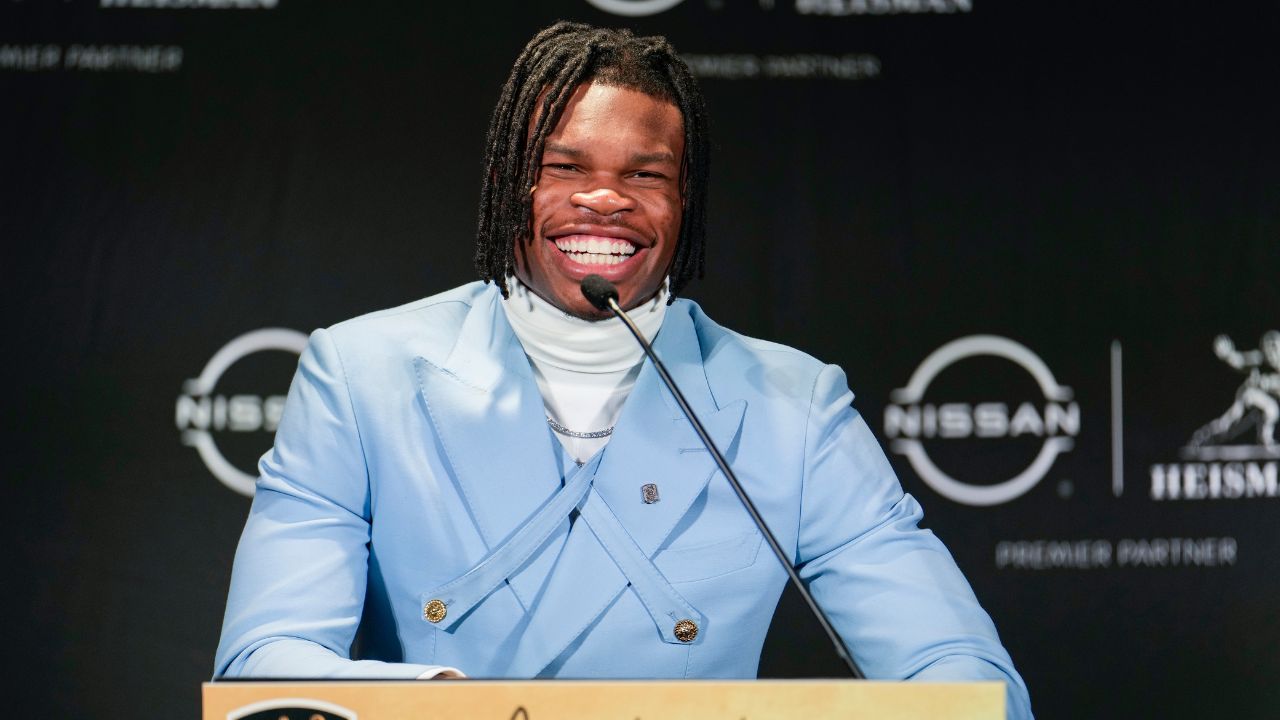 Colorado Buffaloes wide receiver/cornerback Travis Hunter speaks to the press after winning the 2024 Heisman Trophy.