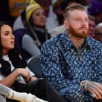 Jan 11, 2024; Los Angeles, California, USA; Las Vegas Raiders player Maxx Crosby with wife Rachel Washburn attend the game between the Los Angeles Lakers and Phoenix Suns at Crypto.com Arena.