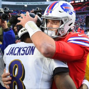 Baltimore Ravens quarterback Lamar Jackson (8) and Buffalo Bills quarterback Josh Allen (17) embrace following the game at New Era Field.