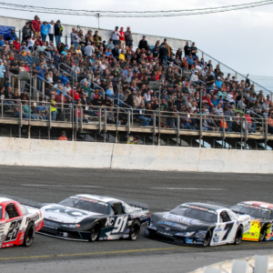 Racers make their way around the track during the 56th Annual Snowball Derby at Five Flags Speedway Sunday, December 3, 2023.