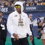 Deion Sanders with E. Dewey Smith