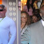 Joe Rogan (L), Evander Holyfield (R)