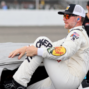 Dale Earnhardt Jr. gets out of his car for a rain delay in qualifying for the 16th Annual Hampton Heat at Langley Speedway.