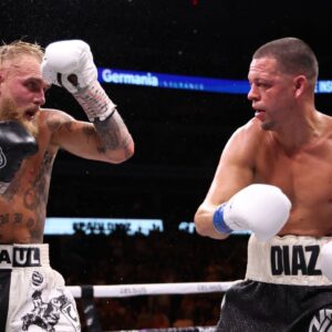 Jake Paul (left) fights against Nate Diaz in a boxing match at American Airlines Center.