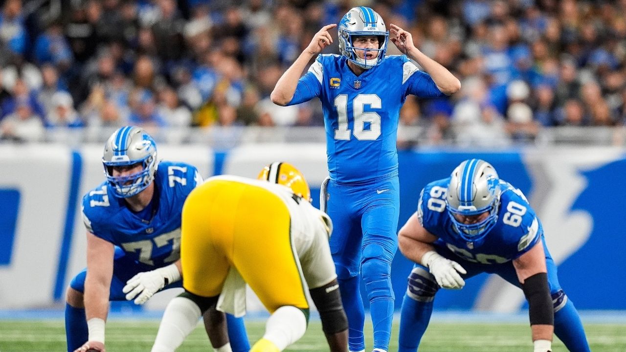 Detroit Lions quarterback Jared Goff (16) talks to teammates before a snap against Green Bay Packers during the first half at Ford Field in Detroit on Thursday, Dec. 5, 2024.