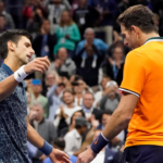 Novak Djokovic of Serbia (left) greets Juan Martin del Potro of Argentina after the men's final on day fourteen of the 2018 U.S. Open