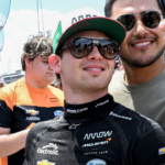 Arrow McLaren driver Pato O'Ward (5) takes a photo with a fan Friday, May 24, 2024, during Carb Day ahead of the 108th running of the Indianapolis 500 at Indianapolis Motor Speedway.