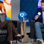 Fan Duel TV host Kay Adams interviews Former NFL tight end Rob Gronkowski about the Kick of Destiny during a press conference at the Phoenix Convention Center.