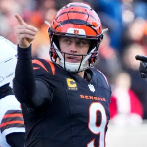 Cincinnati Bengals quarterback Joe Burrow (9) and running back Chase Brown (30) celebrate after a first down run by Burrow in the second quarter of the NFL Week 16 game between the Cincinnati Bengals and the Cleveland Browns at Paycor Stadium in downtown Cincinnati on Sunday, Dec. 22, 2024. The Bengals led 17-0 at halftime.