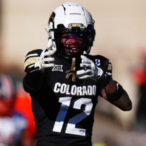 Nov 29, 2024; Boulder, Colorado, USA; Colorado Buffaloes wide receiver Travis Hunter (12) celebrates his first down reception in the fourth quarter against the Oklahoma State Cowboys at Folsom Field.