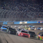 NASCAR Xfinity Series driver Jesse Love (2) and driver Justin Allgaier (7) lead the field for the restart during the NASCAR Xfinity Series championship race at Phoenix Raceway.