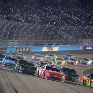 NASCAR Xfinity Series driver Jesse Love (2) and driver Justin Allgaier (7) lead the field for the restart during the NASCAR Xfinity Series championship race at Phoenix Raceway.