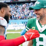 Tennessee Titans defensive tackle Jeffery Simmons (98) and New York Jets quarterback Aaron Rodgers (8) talk after their game at Nissan Stadium in Nashville, Tenn., Sunday, Sept. 15, 2024. The visiting Jets came out on top 24-17.