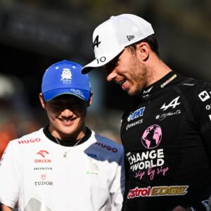 French driver Pierre Gasly ( Alpine F1 Team) and japanese driver Yuki Tsunoda ( Visa Cash App RB Racing) are seen during the Drivers Parade before the FIA Formula 1 Abu Dhabi Grand Prix