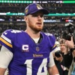Minnesota Vikings quarterback Sam Darnold (14) walks off the field after the game against the Green Bay Packers at U.S. Bank Stadium.