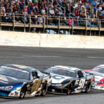Racers make their way around the track during the 56th Annual Snowball Derby at Five Flags Speedway Sunday, December 3, 2023.
