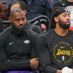 Los Angeles Lakers forward LeBron James (23) and forward Anthony Davis (3) on the bench against the Minnesota Timberwolves in the fourth quarter at Target Center.