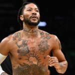 Memphis Grizzlies guard Derrick Rose (23) warms up before a game against the Boston Celtics at TD Garden.