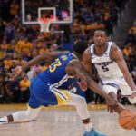 Draymond Green (L) and De'Aaron Fox (R)