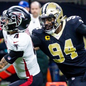 Dec 18, 2022; New Orleans, Louisiana, USA; New Orleans Saints defensive end Cameron Jordan (94) sacks Atlanta Falcons quarterback Desmond Ridder (4) but it called back for a fack mask penalty during the second half at Caesars Superdome.