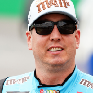 NASCAR Cup Series driver Kyle Busch (18) walks to his car before the start of the Quaker State 400 at Atlanta Motor Speedway.