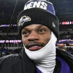 Baltimore Ravens quarterback Lamar Jackson (8) on the field after the game against the Cleveland Browns at M&T Bank Stadium.