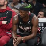 Miami Heat forward Jimmy Butler (22) looks on from the bench during the second half at Kaseya Center.