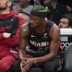 Miami Heat forward Jimmy Butler (22) looks on from the bench during the second half at Kaseya Center.