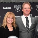 Jan 9, 2018; Alameda, CA, USA; Jon Gruden and wife Cindy Gruden pose with sons Deuce Gruden, Michael Gruden and Jon Gruden III pose at press conference after being introduced as Oakland Raiders head coach at the Raiders headquarters.