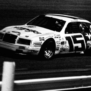 Young Chesapeake, Va., driver Ricky Rudd (15) speeds around the Nashville International Raceway oval during early action of the Nashville Coors 420 on May 12, 1984. © Ricky Rogers / The Tennessean / USA TODAY NETWORK via Imagn Images.