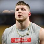Ohio State Buckeyes defensive end Jack Sawyer (33) warms up before the CFP National Championship college football game at Mercedes-Benz Stadium.