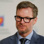 NASCAR legend Dale Earnhardt Jr. talks to media following the Memorial Tournament Legends Luncheon at the Ohio Union. Earnhardt emceed the event.