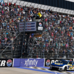 NASCAR Cup Series driver Chase Elliott (9) crosses the finish line to win the DuraMAX Drydene 400 at Dover Motor Speedway.