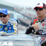 Sprint Cup Series driver Mark Martin (55) and driver Kevin Harvick (29) wait for the start of the FedEx 400 Benefiting Autism Speaks at Dover International Speedway.