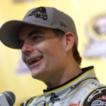Sprint Cup Series driver Jeff Gordon (24) talks to the media after the Ford EcoBoost 400 at Homestead-Miami Speedway.
