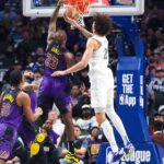 Los Angeles Lakers forward LeBron James (23) dunks past Dallas Mavericks center Dereck Lively II (2) during the first quarter at American Airlines Center.