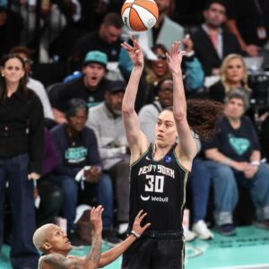 New York Liberty forward Breanna Stewart (30) shoots over Minnesota Lynx guard Courtney Williams (10) in the first quarter during game five of the 2024 WNBA Finals at Barclays Center.