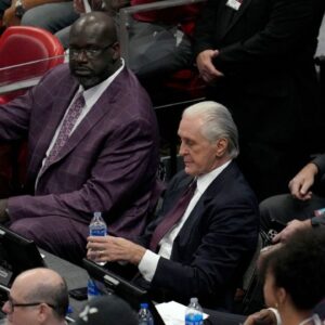Shaquille O'Neal, Pat Riley and Alonzo Mourning during the second half of game three of the Eastern Conference Finals between the Boston Celtics and Miami Heat for the 2023 NBA playoffs at Kaseya Center.