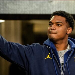 Michigan defensive back Will Johnson (2) high-fives fans during warm up before the Michigan State game at Michigan Stadium in Ann Arbor on Saturday, Oct. 26, 2024.