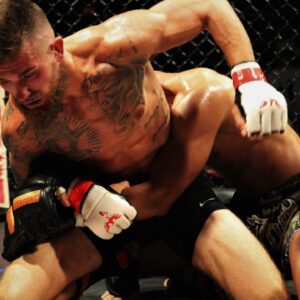 allahassee's Southea Nou (camo shorts), out of Train. Fight. Win., defeated Tallahassee's Adam Draves (black shorts), out of Double Fist MMA, by unanimous decision in a 135-pound amateur MMA fight during Combat Night Pro 14 at The Moon nightclub on July 20, 2019. A45c2638