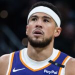 Phoenix Suns guard Devin Booker (1) reacts in the first half against the Indiana Pacers at Gainbridge Fieldhouse.