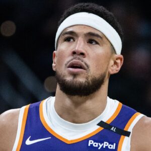 Phoenix Suns guard Devin Booker (1) reacts in the first half against the Indiana Pacers at Gainbridge Fieldhouse.