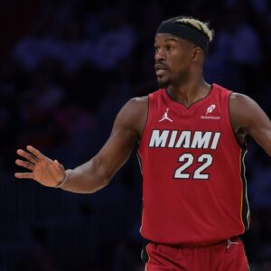 Miami Heat forward Jimmy Butler (22) reacts against the Portland Trail Blazers during the third quarter at Kaseya Center.