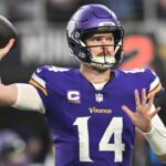Dec 29, 2024; Minneapolis, Minnesota, USA; Minnesota Vikings quarterback Sam Darnold (14) throws a pass against the Green Bay Packers during the first quarter at U.S. Bank Stadium.