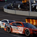Aug 11, 2024; Richmond, Virginia, USA; NASCAR Cup Series driver Daniel Suarez (99) during the Cook Out 400 at Richmond Raceway. Mandatory Credit: Peter Casey-Imagn Images