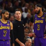 Los Angeles Lakers head coach JJ Redick with guard Gabe Vincent (7) and forward Anthony Davis (3) against the Phoenix Suns at Footprint Center