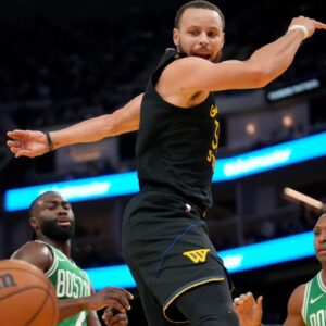 Golden State Warriors guard Stephen Curry (30) has the ball knocked out of his hands against the Boston Celtics in the third quarter at the Chase Center.